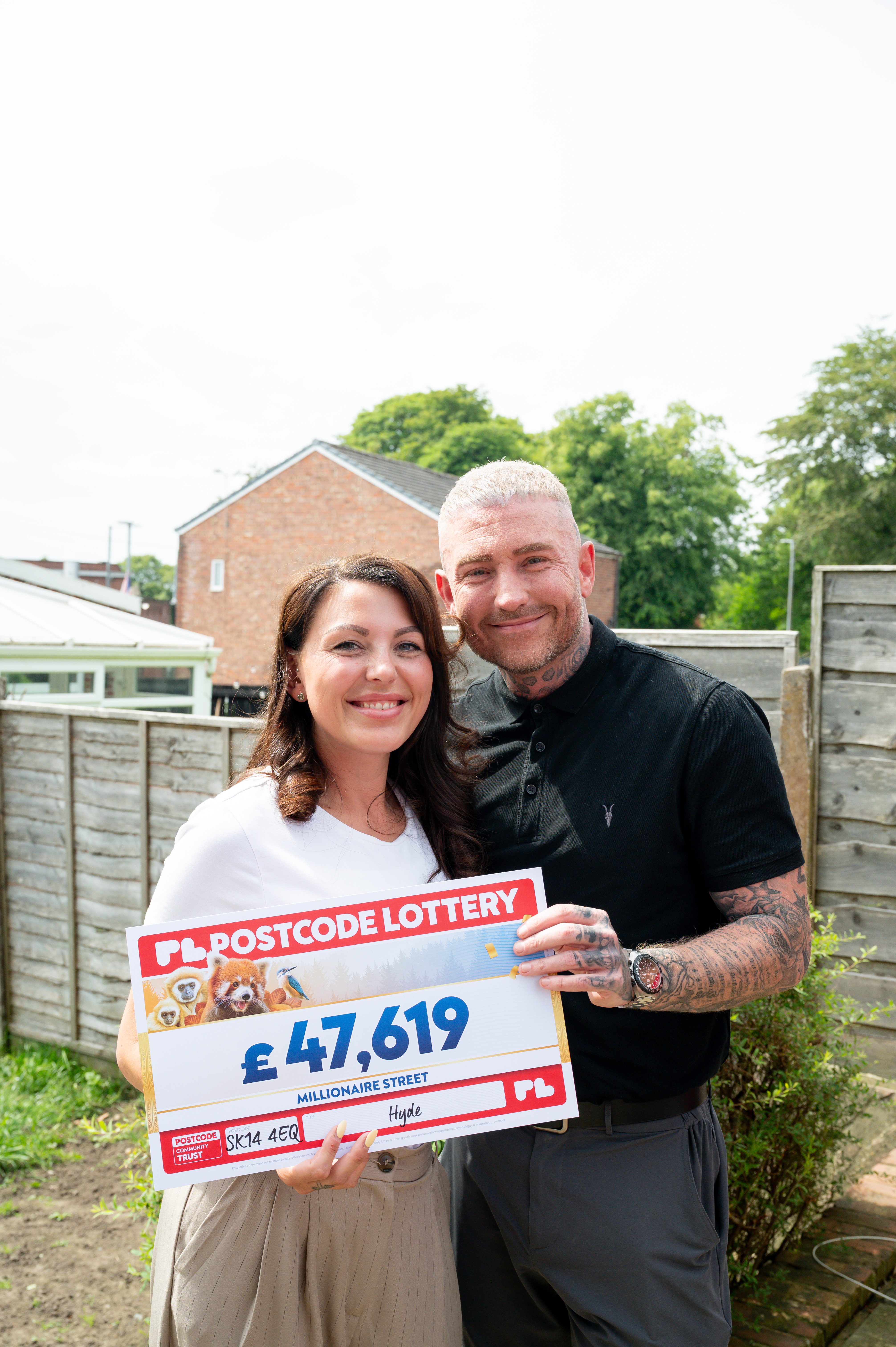 Happy couple plan their spending