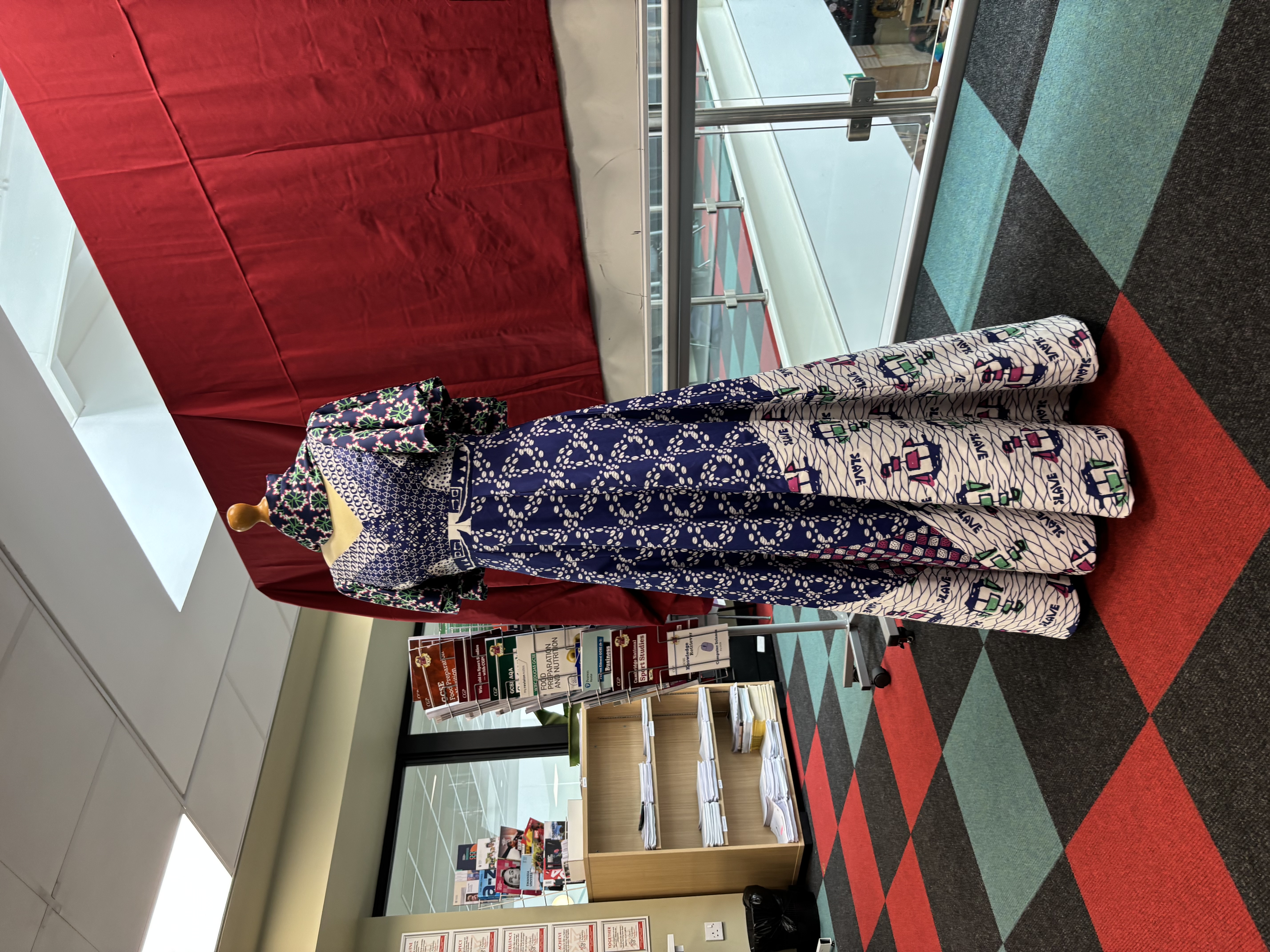 The completed dress takes its inspiration from a 1930s Cotton Queen dress in Portland Basin Museum's collection
