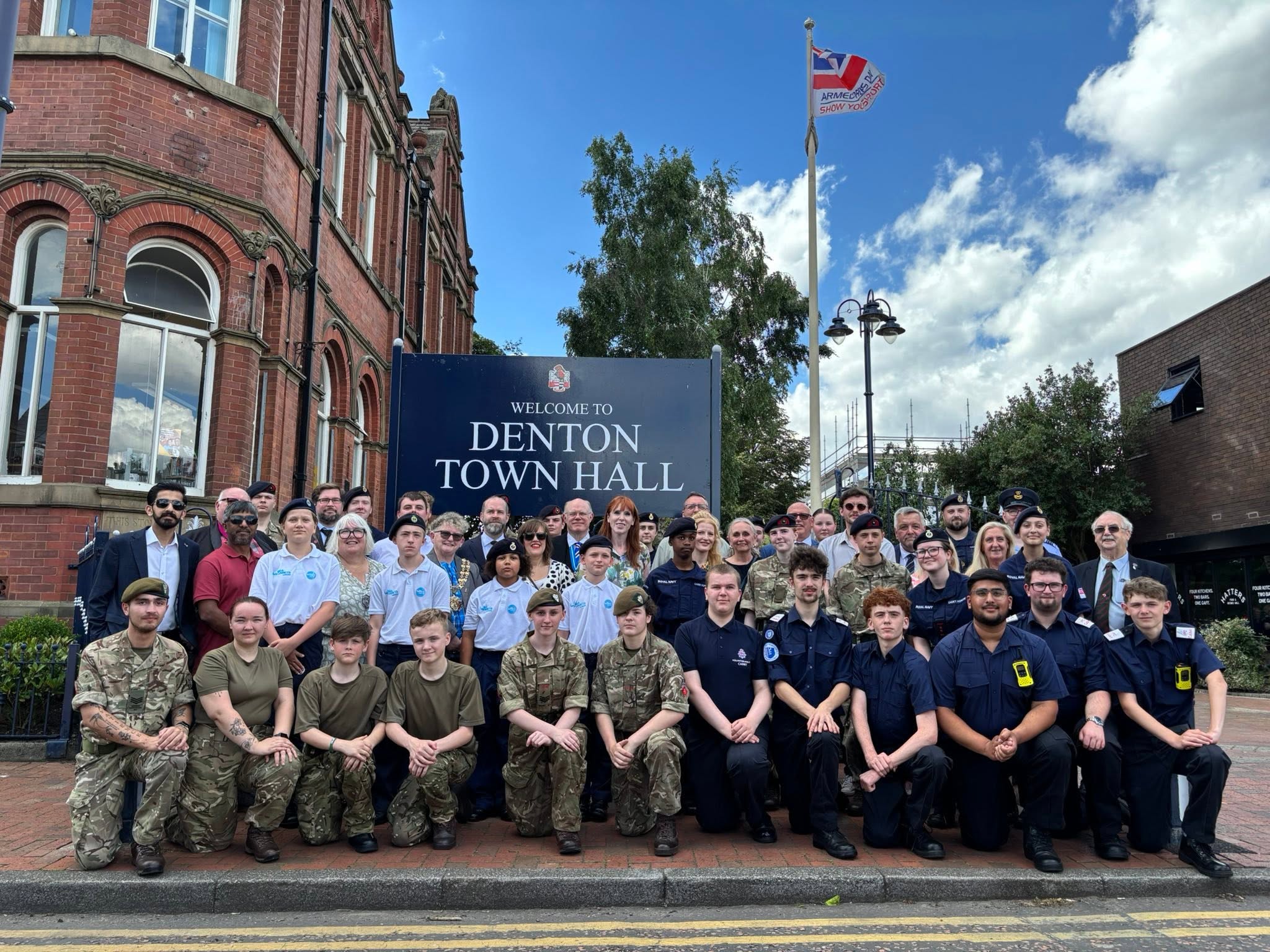 Veterans, serving personnel, residents and dignitaries outside Denton Town Hall