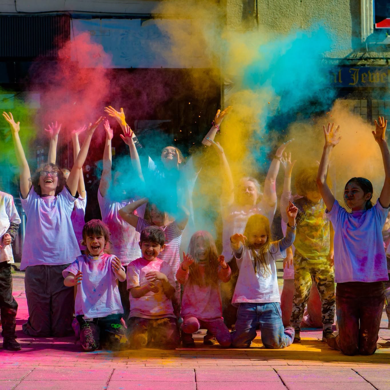 Young people taking part in a creative and colourful activity