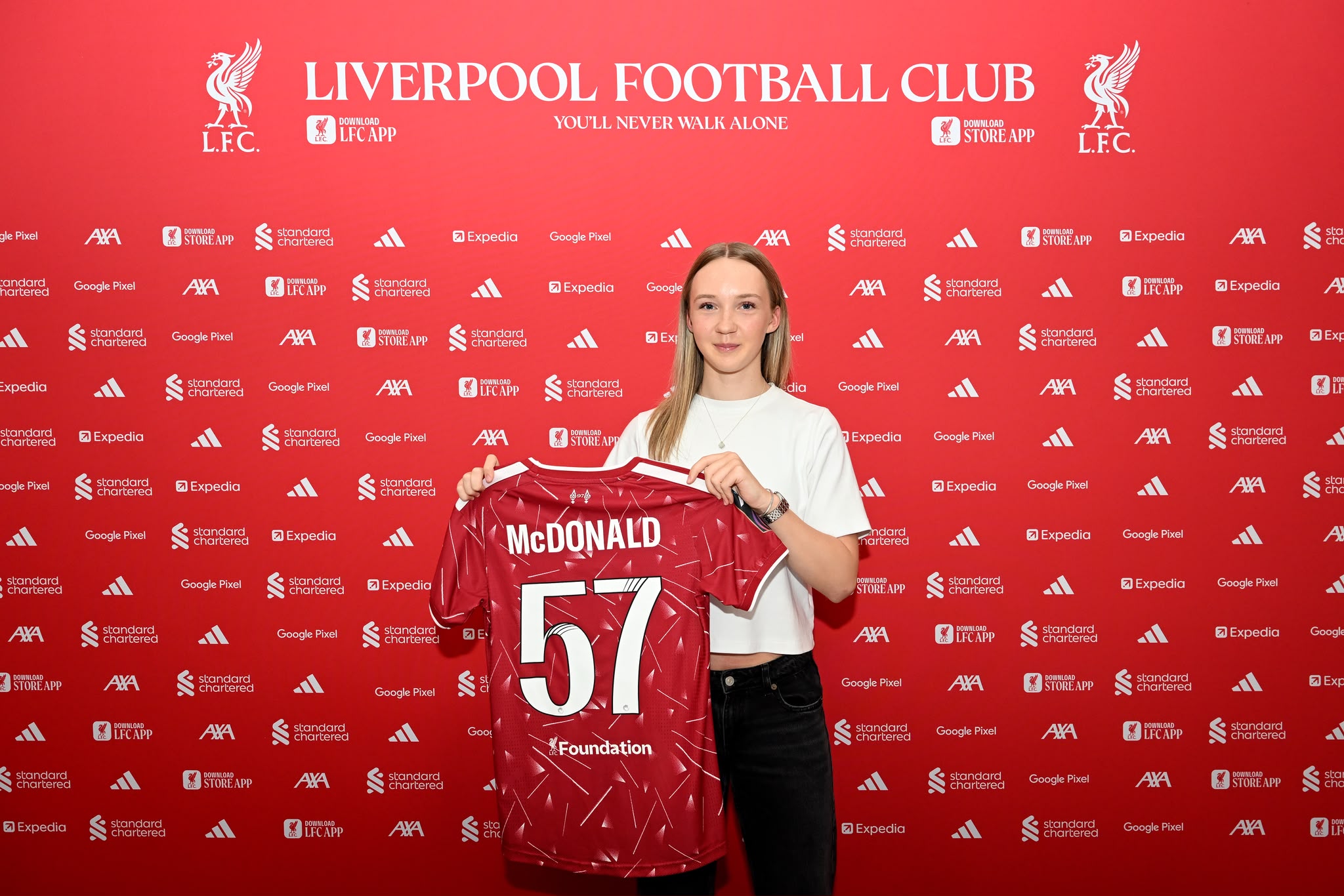 Neve McDonald after signing her first professional contract with Liverpool FC