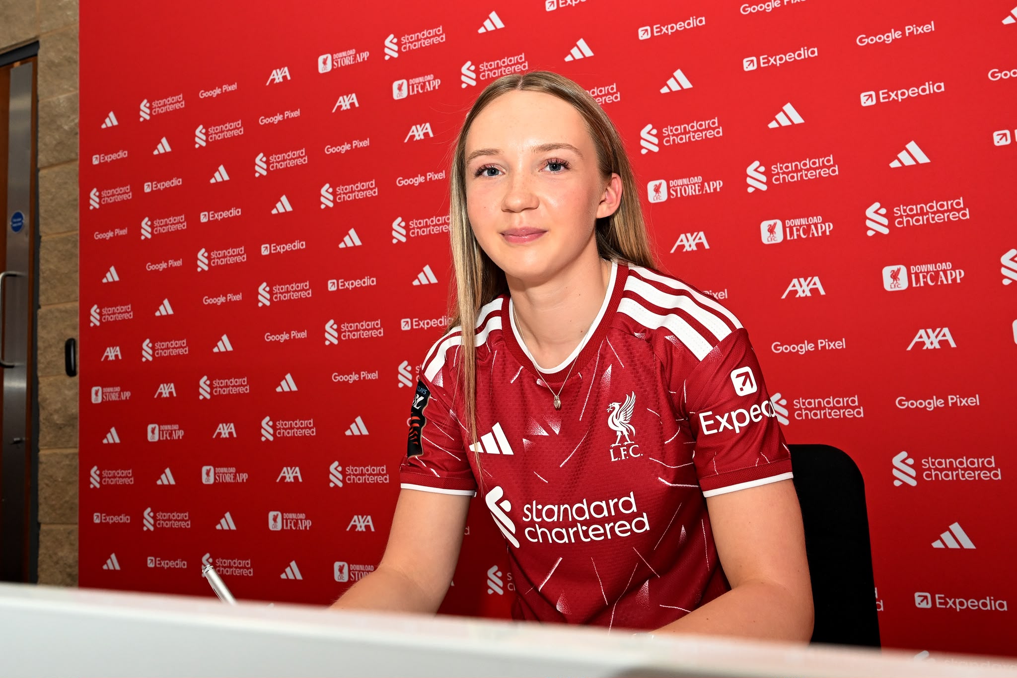 Neve McDonald after signing her first professional contract with Liverpool FC