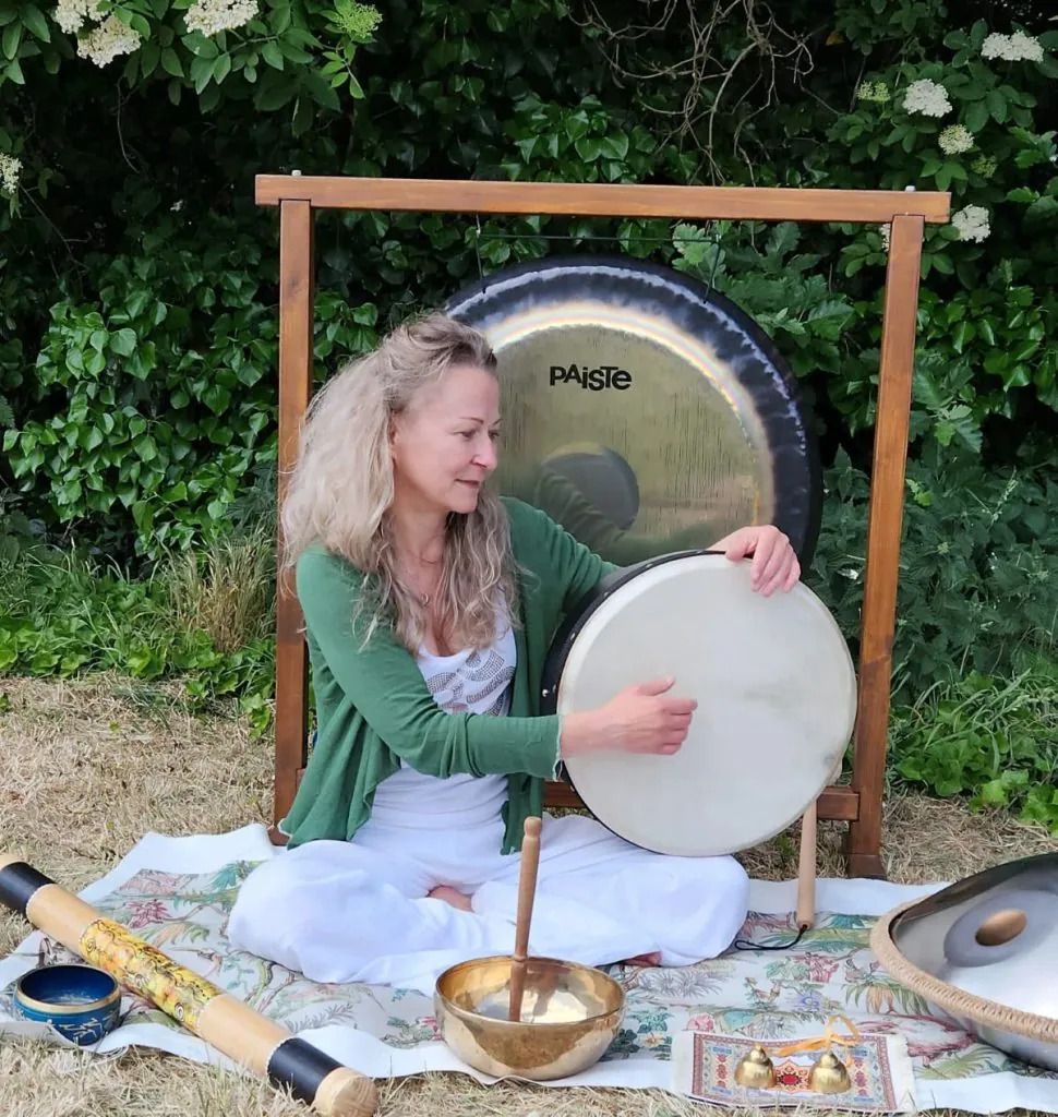 A woman with a sound bath
