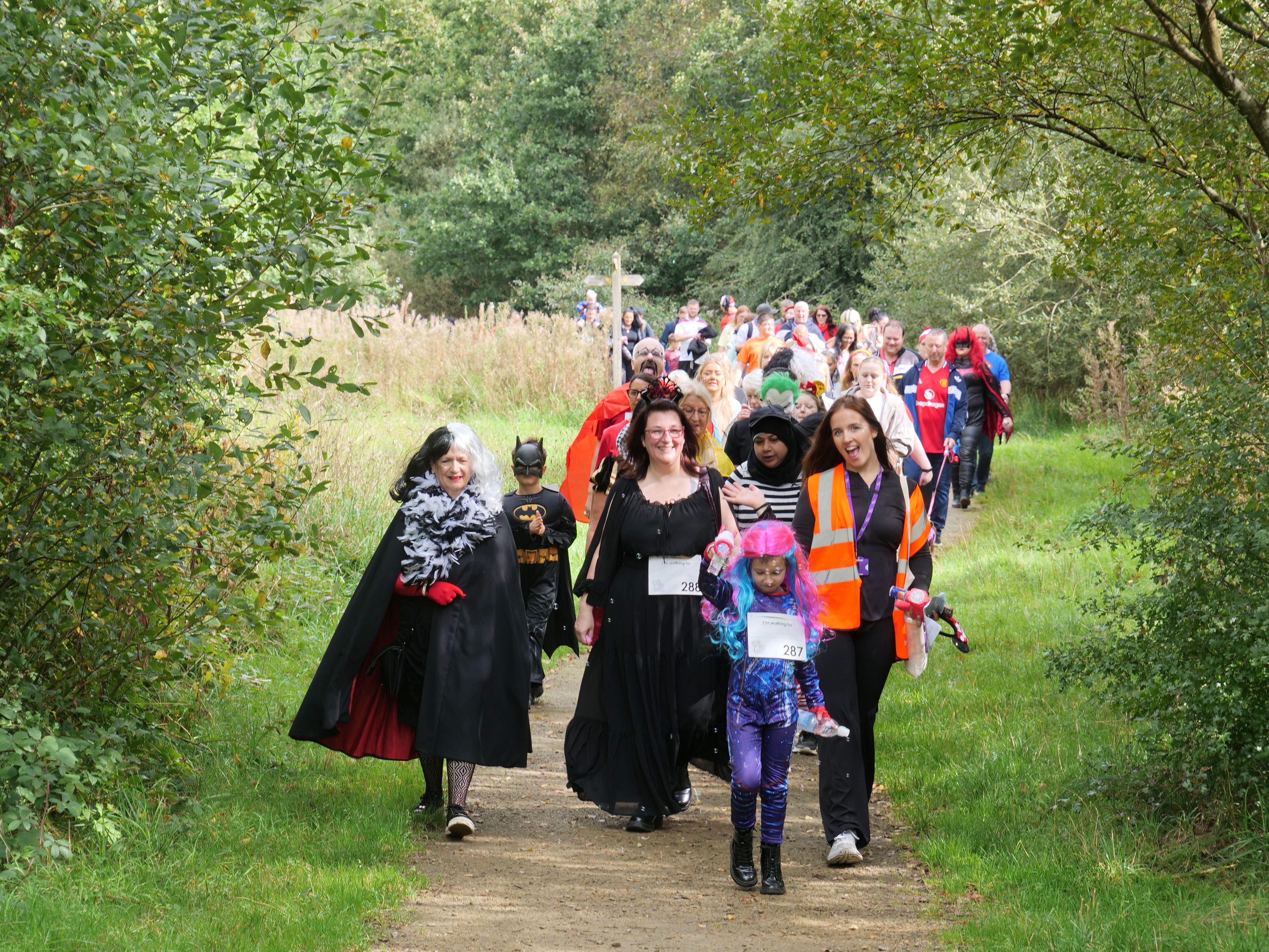The walkers dressed in their costumes heading around Chadwick Dam