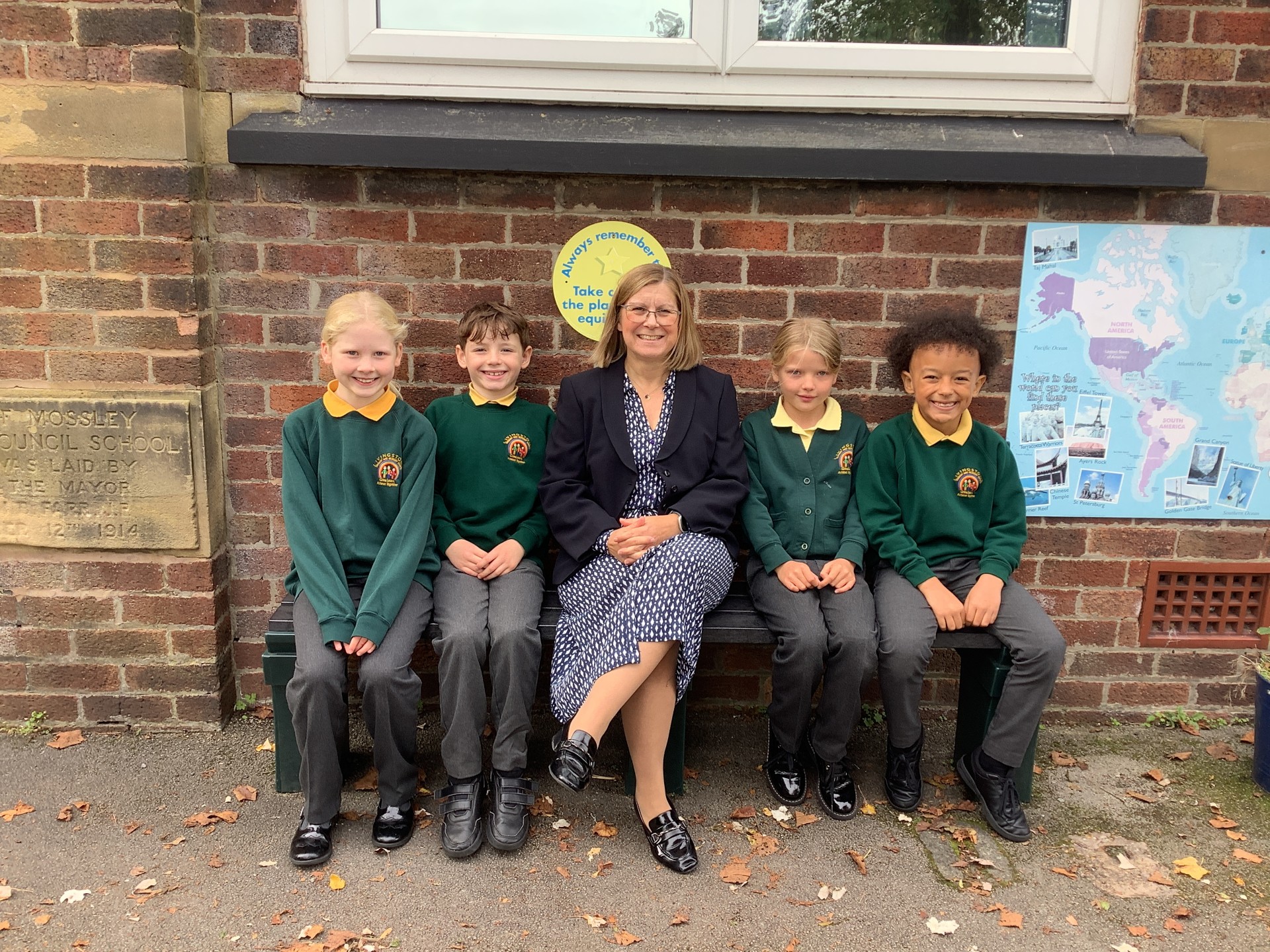 Head teacher Rebecca Willard with pupils from Livingstone Primary